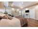Spacious main bedroom with hardwood floors and large windows at 430 Federal Rd, Benson, NC 27504