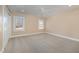 Spacious bedroom with neutral walls, carpet and ceiling fan at 430 Federal Rd, Benson, NC 27504