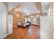 Primary bedroom with hardwood floors, tray ceiling and plenty of natural light at 430 Federal Rd, Benson, NC 27504