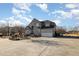 Brick home with attached garage and large yard at 430 Federal Rd, Benson, NC 27504