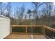 Wooden deck overlooks private wooded backyard at 4323 Pond Pine Trl, Morrisville, NC 27560