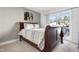 Bedroom with a wooden sleigh bed and access to a balcony at 437 Wait Ave # 100, Wake Forest, NC 27587