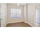 Bright dining area with tile flooring and access to kitchen at 4407 Still Pines Dr, Raleigh, NC 27613