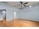 Spacious bedroom with hardwood floors and ceiling fan at 444 S Blount St # 316, Raleigh, NC 27601