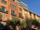 Brick building exterior with balconies and city views at 444 S Blount St # 316, Raleigh, NC 27601