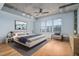 Main bedroom with hardwood floors and stylish furnishings at 444 S Blount St # 316, Raleigh, NC 27601