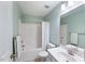 Bathroom with tub, shower, and vanity with updated fixtures at 4533 Sugarbend Way, Raleigh, NC 27606