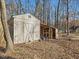 Wooden storage shed in the backyard at 504 Meadow Run, Knightdale, NC 27545