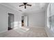 Bright and airy bedroom with carpeted flooring and ample natural light at 512 Nightingale Ct, Wake Forest, NC 27587