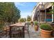 Outdoor patio with wood table and chairs, perfect for dining al fresco at 512 Nightingale Ct, Wake Forest, NC 27587