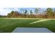 Spacious backyard with grassy lawn and patio at 553 Tim Currin Rd, Lillington, NC 27546