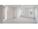 Spacious bedroom with carpet flooring and large windows at 553 Tim Currin Rd, Lillington, NC 27546