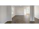 Bright dining area with hardwood floors and access to other rooms at 553 Tim Currin Rd, Lillington, NC 27546