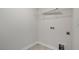 Laundry room with shelving and hookups at 553 Tim Currin Rd, Lillington, NC 27546