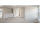 Spacious loft area with carpet and large window at 553 Tim Currin Rd, Lillington, NC 27546