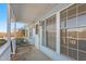 Covered front porch with white railing and light fixtures at 6008 Crosscreek Dr, Mebane, NC 27302