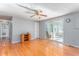 Spacious living room with hardwood floors and access to a sunroom at 6008 Crosscreek Dr, Mebane, NC 27302