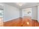 Bright living room with hardwood floors and chandelier at 6008 Crosscreek Dr, Mebane, NC 27302