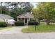 Tan colored house with a small front yard and mailbox at 602 Dogwood St, Fuquay Varina, NC 27526