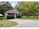 Lovely single-story home featuring a well-kept yard and a paved driveway at 602 Dogwood St, Fuquay Varina, NC 27526