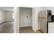 White closet doors hide the laundry area at 602 Dogwood St, Fuquay Varina, NC 27526