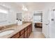 Bathroom with double vanity, granite counters, and walk-in shower at 603 Tuttle Rd, Durham, NC 27703