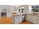 Kitchen with island, granite countertops, and stainless steel appliances at 7004 Cedar Bend Ct, Raleigh, NC 27612