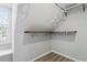 Large walk-in closet with ample shelving and hanging space at 706 Sleepy Creek Dr, Durham, NC 27713