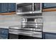 Stainless steel stove and microwave in a modern kitchen at 706 Sleepy Creek Dr, Durham, NC 27713