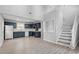 Modern kitchen with blue cabinets and stainless steel appliances at 706 Sleepy Creek Dr, Durham, NC 27713