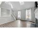 Bright living room featuring hardwood floors and a fireplace at 706 Sleepy Creek Dr, Durham, NC 27713