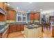 Modern kitchen with granite countertops, custom cabinetry, and stainless steel appliances at 81004 Alexander, Chapel Hill, NC 27517