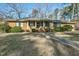 Ranch style brick home with a walkway leading to the front porch at 108 Pinewood Ave, Rocky Mount, NC 27804