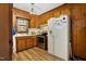 Bright kitchen with wood cabinets and stainless steel appliances at 108 Pinewood Ave, Rocky Mount, NC 27804
