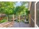 This backyard features a pond and a fenced-in area at 11712 Black Horse Run, Raleigh, NC 27613