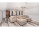 The basement features a sectional sofa and a ping pong table at 11712 Black Horse Run, Raleigh, NC 27613