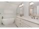This primary bathroom features double sinks, soaking tub, and tile flooring at 11712 Black Horse Run, Raleigh, NC 27613