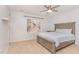 Bedroom with carpet, ceiling fan and natural light from a large window at 11712 Black Horse Run, Raleigh, NC 27613