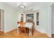 Cozy dining area features a bay window and comfortable seating at 11712 Black Horse Run, Raleigh, NC 27613