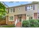 Inviting brick home featuring traditional design and well-maintained landscaping at 11712 Black Horse Run, Raleigh, NC 27613