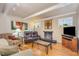 Living room with hardwood floors and a fireplace at 1616 Glengarry Dr, Cary, NC 27511