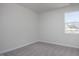 Neutral bedroom with carpet and a bright window at 18 Fairwinds Drive Dr, Lillington, NC 27546