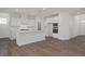 Open-concept kitchen with a central island, and modern appliances at 18 Fairwinds Drive Dr, Lillington, NC 27546