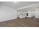 Open concept living and kitchen area with recessed lighting, hardwood floors at 18 Fairwinds Drive Dr, Lillington, NC 27546