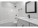 Bathroom with single vanity, tub shower combo and white cabinets at 195 Daniel Ridge Ln, Roxboro, NC 27574