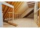 Unfinished bonus room with wood framing and subflooring at 195 Daniel Ridge Ln, Roxboro, NC 27574