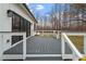 Spacious deck with white railings, offering backyard access at 195 Daniel Ridge Ln, Roxboro, NC 27574