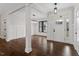 Bright dining room with hardwood floors and wainscoting at 195 Daniel Ridge Ln, Roxboro, NC 27574