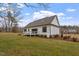 Side view of house with deck and landscaping at 195 Daniel Ridge Ln, Roxboro, NC 27574