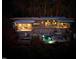 Stunning aerial view of a modern home with a pool, outdoor living spaces, and lush surroundings at 196 Paces Mill Trl, Pittsboro, NC 27312